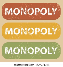 Set of rubber stamps with word MONOPOLY on colored background