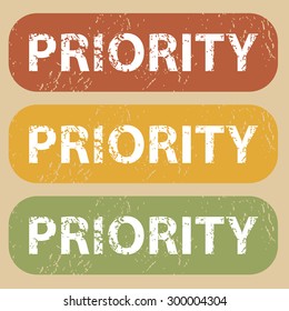 Set of rubber stamps with word PRIORITY on colored background