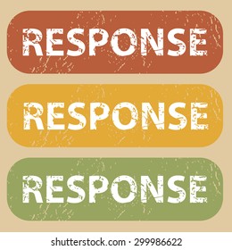 Set of rubber stamps with word RESPONSE on colored background