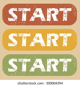 Set of rubber stamps with word START on colored background