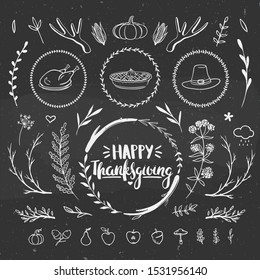 Set of rustic doodles on a chalkboard. Vector floral doodles drawn with chalk on black background.