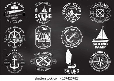 Set of sailing camp and yacht club badge. Vector on the chalkboard. Concept for shirt, print, stamp or tee. Vintage typography design with black sea anchors, hand wheel, compass and sextant silhouette