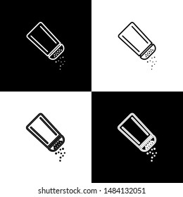 Set Salt and pepper icon isolated on black and white background. Cooking spices.  Vector Illustration