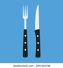 Ein Besteck aus gesalzenem Steak. Gabel und Messer.