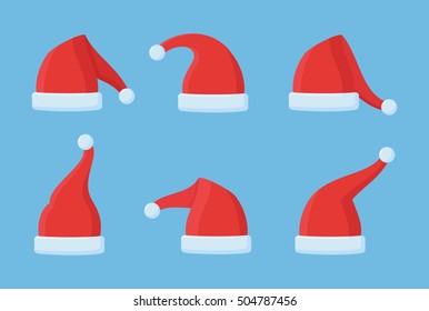 Set of Santa Claus red hats isolated on blue background. Christmas elements. Flat style vector illustration.