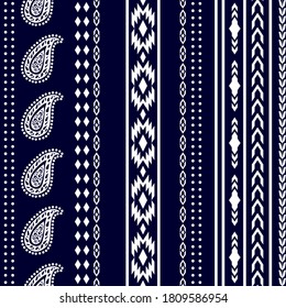 Set of Scandinavian borders. Vertical ornaments with paisleys and geometric elements. Retro textile collection. White on dark blue background.
