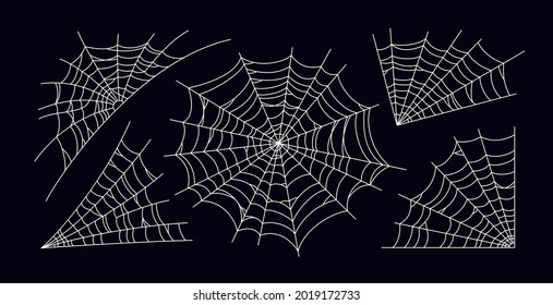 Set of scary spider web. White cobweb silhouette isolated on black background. Hand drawn spider web for Halloween party. Vector illustration.