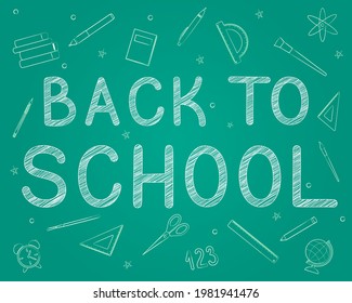 Set of school items in chalk on a green blackboard. Back to school.
