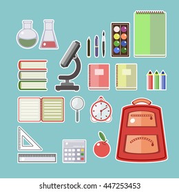 Set of school supplies in a flat style. Vector graphics.