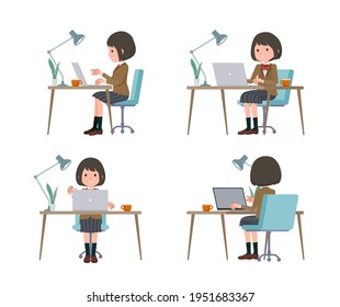 A set of schoolgirl working at a desk at a computer.It's vector art so easy to edit.