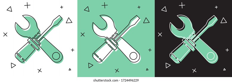 Set Screwdriver and wrench spanner tools icon isolated on white and green, black background. Service tool symbol.  Vector Illustration