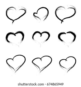 Set Of Scribbled Hearts. Vector grunge style icons collection. Vector illustration of the brush hand drawn sketchy hearts on the white background.