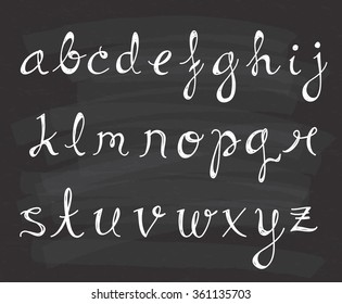 Set of script alphabet on chalkboard background