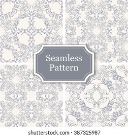Set of seamless abstract lace patterns in gray colors. Four vintage seamless ornamental backgrounds. Vector EPS 10