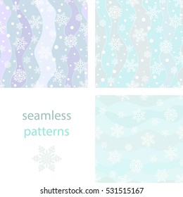 Set of seamless background with snowflakes and snowballs and winding wavy lines on a blue pastel background