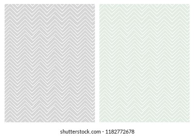 Set of Seamless Cute Chevron Patterns. White Zig Zag Shape a Gray ad Light Mint Green Background. Funny Irregular Design. Infantile Style.
