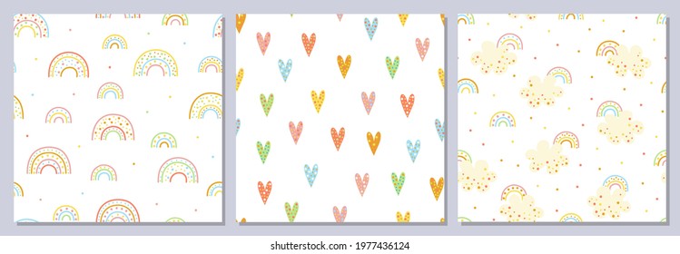 Set of seamless cute patterns. Fun colored cartoon rainbows, hearts, clouds. Sweet dream.