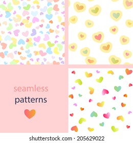 A set of seamless light patterns with colorful hearts