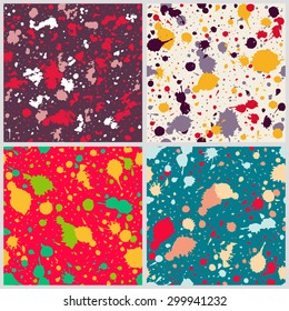 Set of seamless paint splatter patterns. Grunge spotted backgrounds with paint blobs. Collection of seamless paint splashes backdrops. Colorful repetitive textile pattern collection. EPS10.