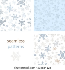 Set of seamless pastel patterns of blue and red swirling in the air  snowflakes on a white background