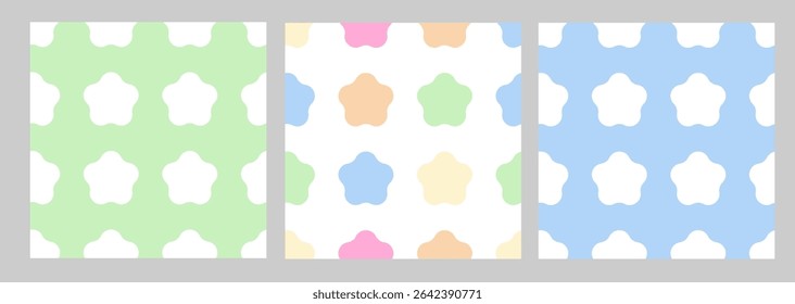 Set of seamless patterns with flower-shaped white silhouettes on green, multicolor, and blue backgrounds. Simple repeating floral tile design. 