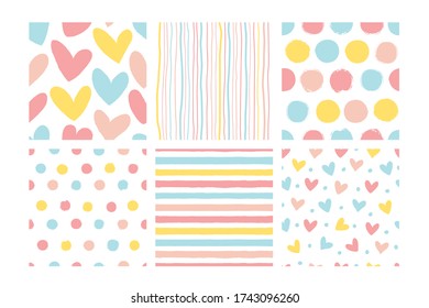 Set of seamless patterns with hearts, stripes and polka dots in pastel colors. Great for baby textiles.