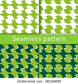 Set of seamless patterns with the image of abstract round elements of green and white color