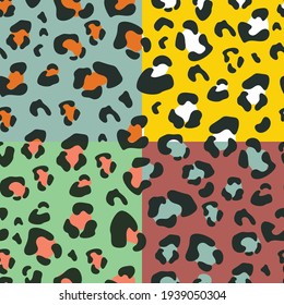 A set of seamless patterns with a leopard print on a colored background. Vector illustration for printing on fabric, wallpaper, packaging paper, clothing. Cute baby background.