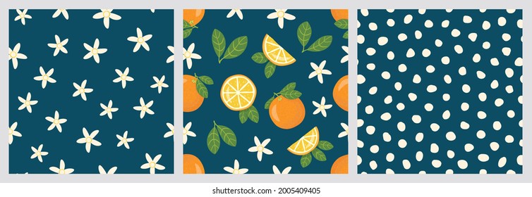 Set of seamless patterns with oranges, flowers, leaves and peas. Pattern on a dark blue background, white polka dots. Vector illustration. 
