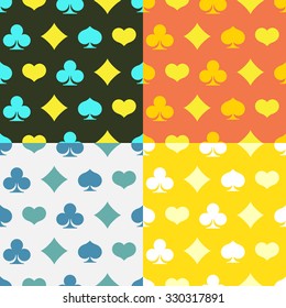 set of seamless patterns with suits of cards