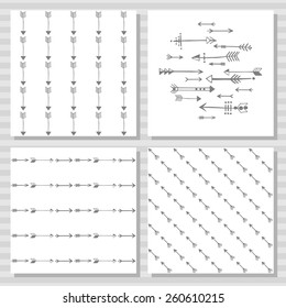 Set of seamless patterns of white and gray arrows. Vector