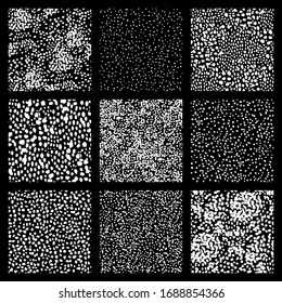 Set of seamless textures, backgrounds. Speckled animalistic dots