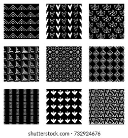 Set of seamless vector patterns. Black and white geometrical endless backgrounds with hand drawn geometric shapes, triangles, circles, dots, lines, Simple graphic design. Repeat decorative ornament.