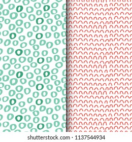 Set of seamless vector patterns with circles and spots in green and red colors. Creative hand drawn textures. Vector illustration