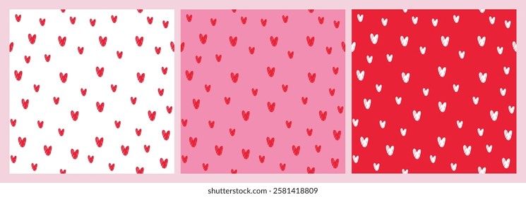 Set of seamless vector patterns dedicated to Valentine day with cute hand drawn hearts in 3 colors