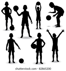 Set of seven young boys playing with ball