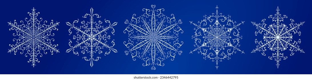 Conjunto de varios hermosos complejos copos de nieve navideños, blanco sobre fondo azul