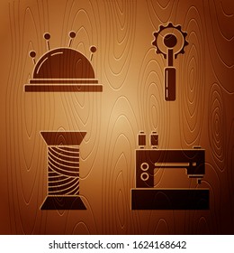 Set Sewing machine, Needle bed and needles, Sewing thread on spool and Cutter tool on wooden background. Vector