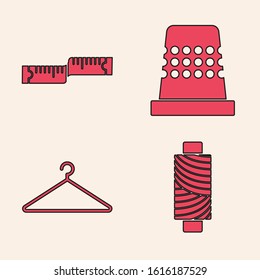 Set Sewing thread on spool, Tape measure, Thimble for sewing and Hanger wardrobe icon. Vector
