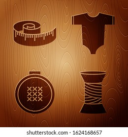 Set Sewing thread on spool, Tape measure, Round adjustable embroidery hoop and Baby clothes on wooden background. Vector