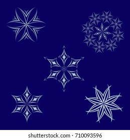 Set of sharp snowflakes on blue background