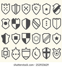 Set of shield icons with symbols. Vector illustration