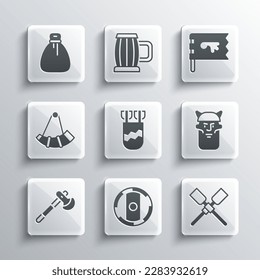Set Shield viking, Oars or paddles boat, Viking head, Quiver with arrows, Wooden axe, Hunting horn, Old money bag and flag icon. Vector