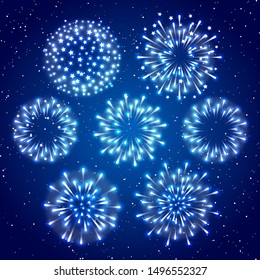 Set of shiny lights  fireworks on starry blue sky background for Christmas and New Year holiday design