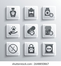 Set Saco de compras animal de estimação, Comida enlatada, Garrafa de remédio para cães, pílula, Anti vermes parasita, Mãos com pegada de animais, Xampu para animais e Saco de ícone. Vetor