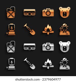 Set Shovel, Bear head, Hunter, Campfire, Camping lantern, Photo camera, Canteen water bottle and Hunting cartridge belt icon. Vector