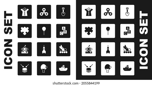 Set Shovel toy, Balloons with ribbon, Puzzle pieces, Toy puppet doll hand, ABC blocks, Fidget spinner, Roller skate and Robot icon. Vector