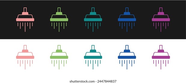 Set Shower head with water drops flowing icon isolated on black and white background.  Vector