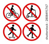 A set of signs prohibiting roller skating, scooters, bicycles and skateboards.