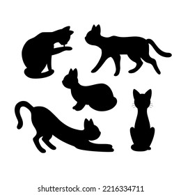 Set of silhouette of cats. Isolated black silhouette of running, sitting, washing, lying, playing cat on white background.